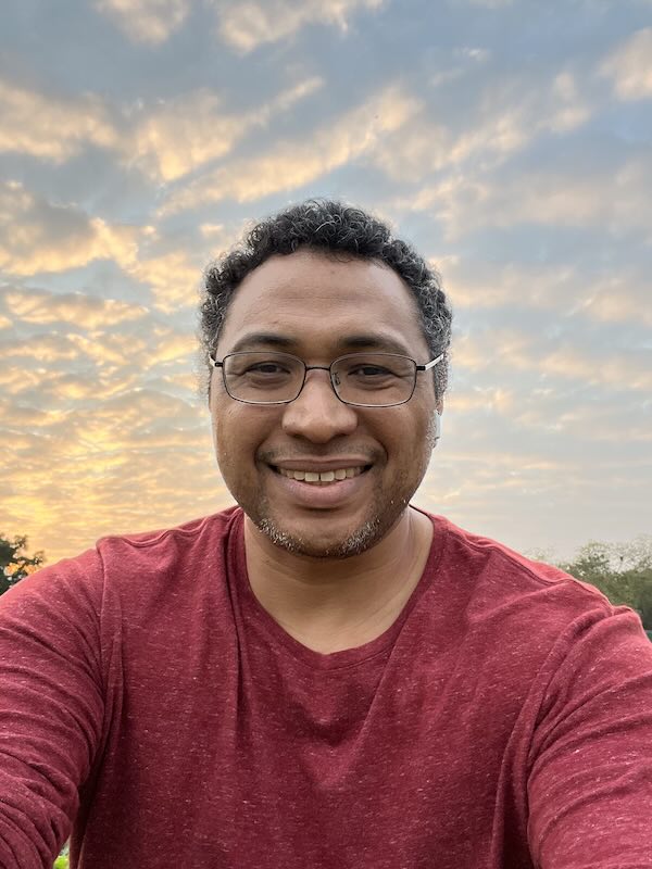 A participant's selfie, taken outdoors at sunset